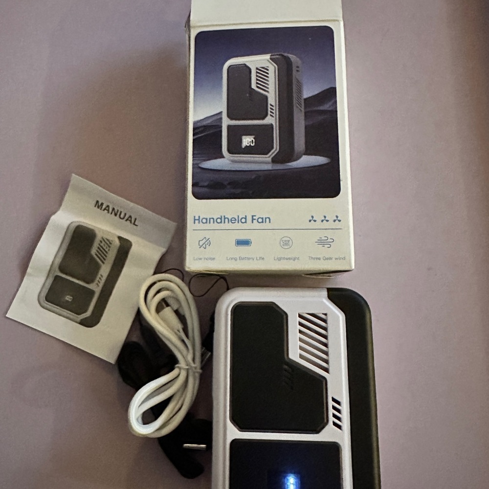 Sleek Black and White Handheld Fan
